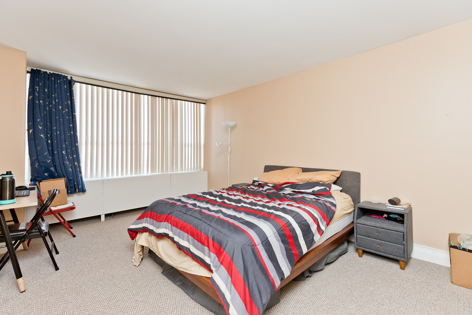 655 West Irving Park Road, Unit 2512 Chicago, IL 60613 - Photo 13 of 18 a bedroom with bed and a window