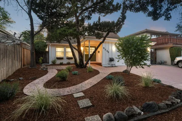 a view of backyard with outdoor space