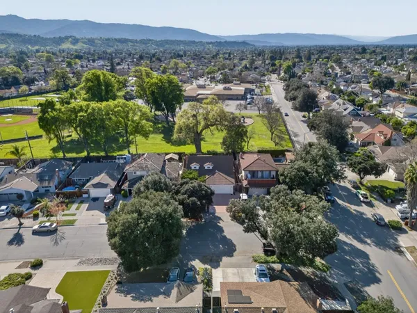 an aerial view of residential house with outdoor space