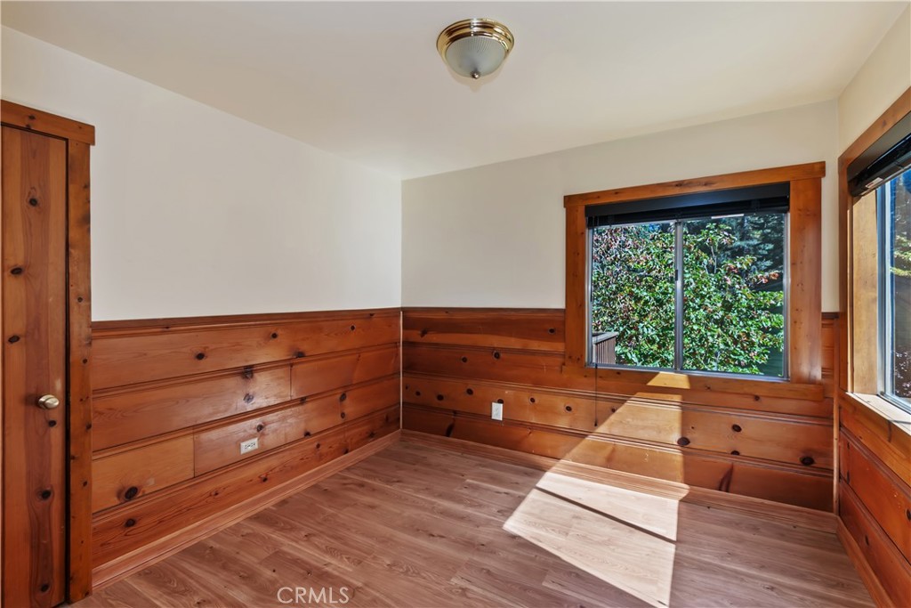863 Oak Road Lake Arrowhead, CA 92385 - Photo 28 of 42 a bed room with a bed and a window