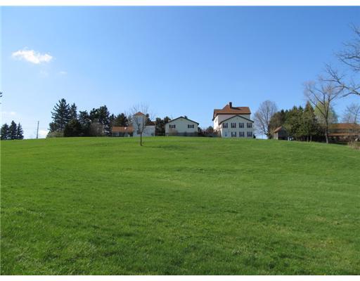 137 Harris Road Butler, PA 16002 - Photo 12 of 18 Exterior Back. Beautiful view from near the pond towards the home