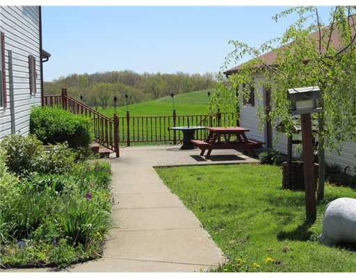 137 Harris Road Butler, PA 16002 - Photo 18 of 18 Patio/Deck. The patio divides the home and garage and has a stairway to the yard