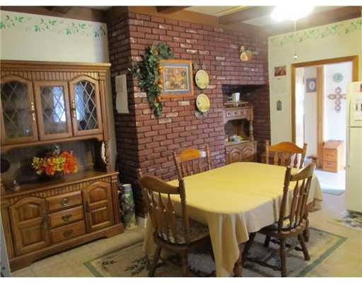 137 Harris Road Butler, PA 16002 - Photo 8 of 18 Kitchen. brick wall in the kitchen makes a great backdrop for your stove