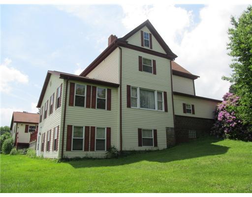 137 Harris Road Butler, PA 16002 - Photo 10 of 18 Exterior Back. Another view of the back corner of the farmhouse