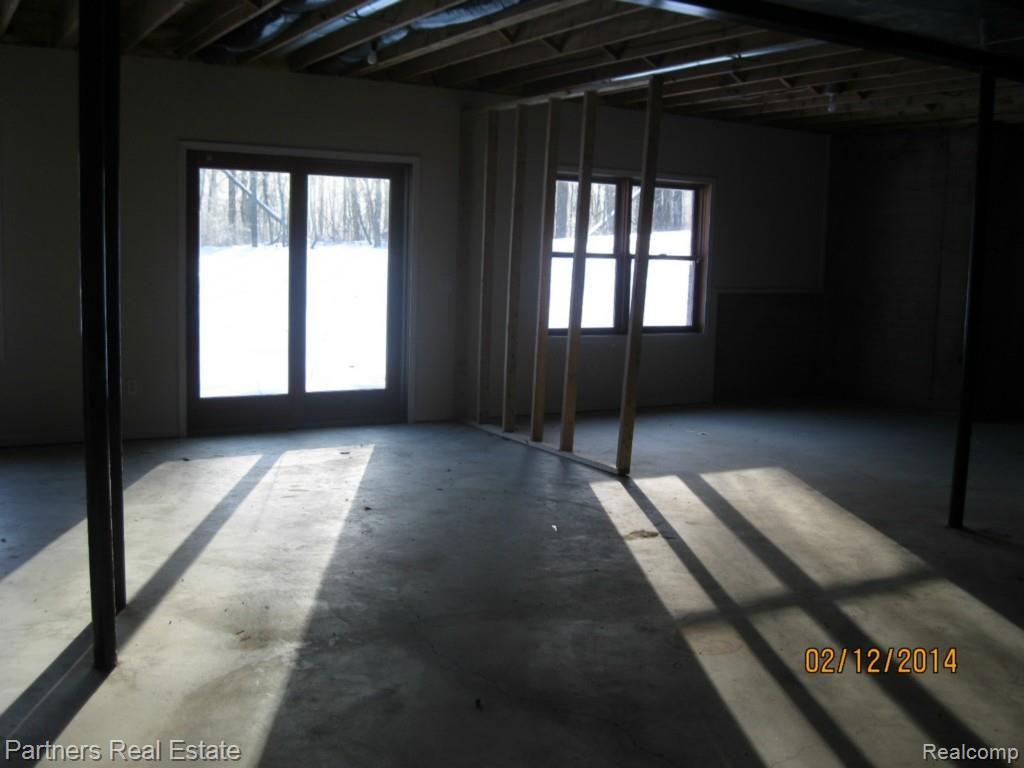 7326 Mack Road Howell, MI 48855 - Photo 18 of 20 Unfinished Walkout Basement.jpg