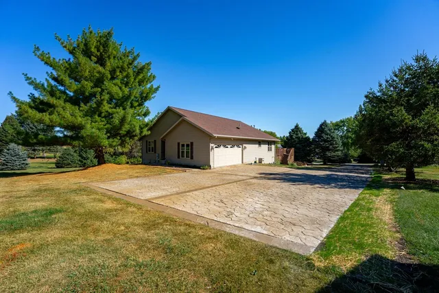 a house with yard in front of it