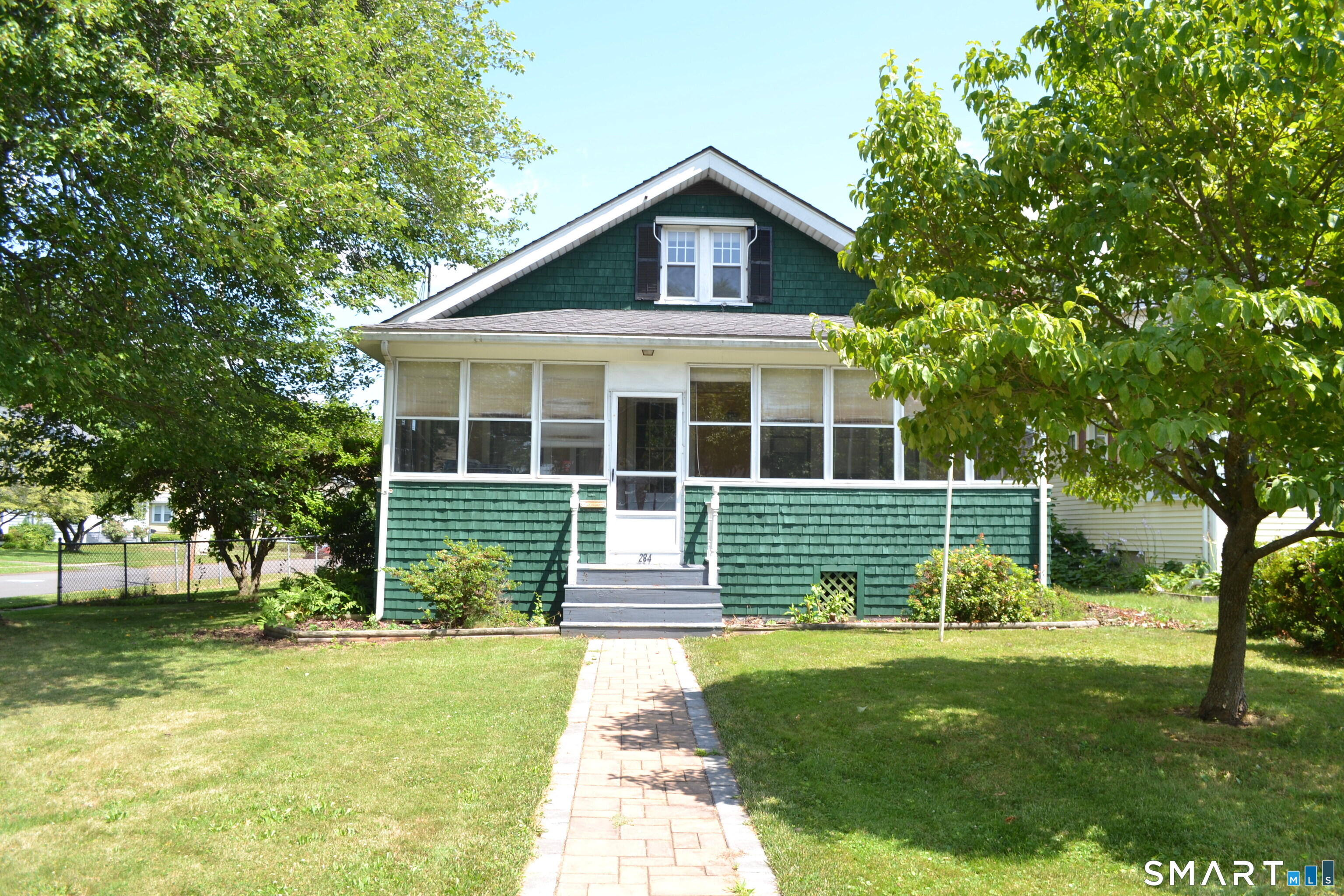 284 Deerfield Road Windsor, CT 06095 - Photo 31 of 31 a view of a house with a yard