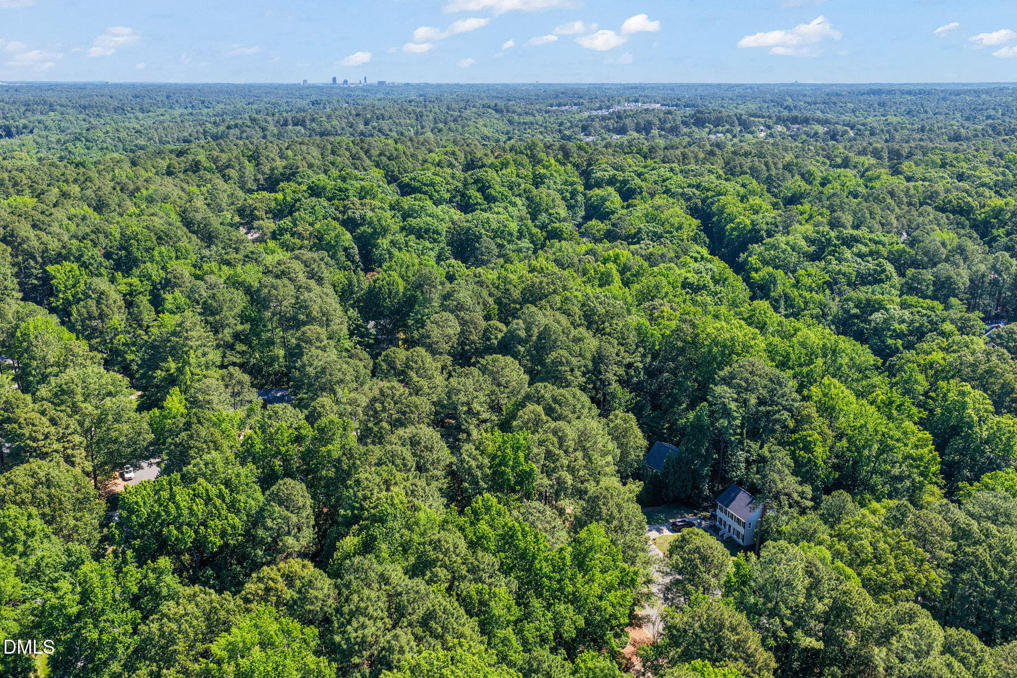 18 Strawberry Ridge Lane Durham, NC 27713 - Photo 57 of 59 an aerial view of a house with a yard