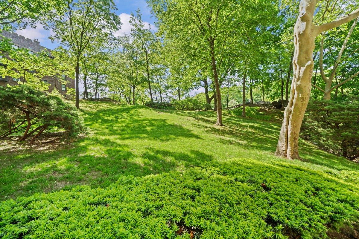 5500 Fieldston Road, Unit 8CC Bronx, NY 10471 - Photo 18 of 27 a view of outdoor space with deck and garden