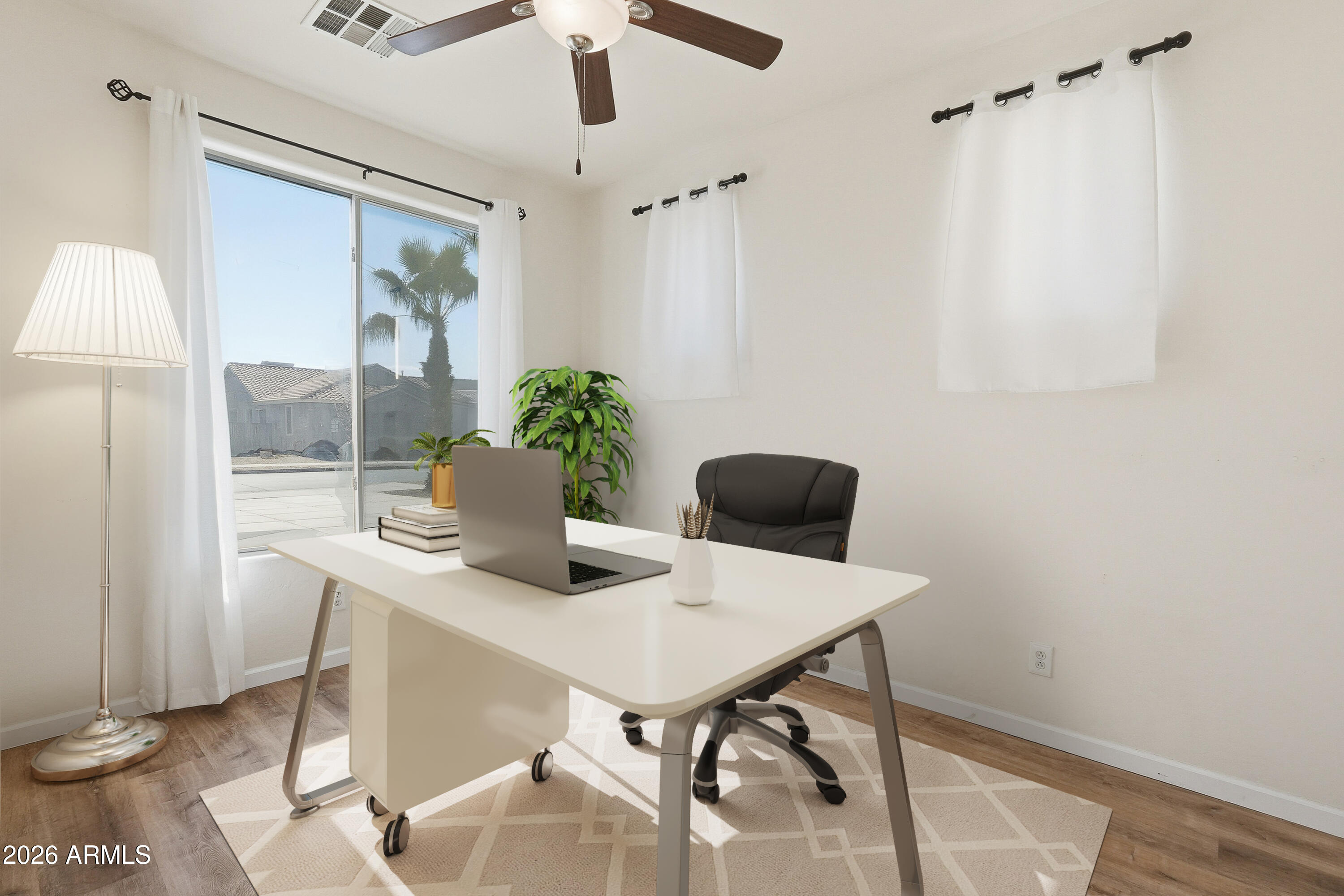 19760 East Mayberry Road Queen Creek, AZ 85142 - Photo 15 of 71 a view of a workspace with furniture and a window