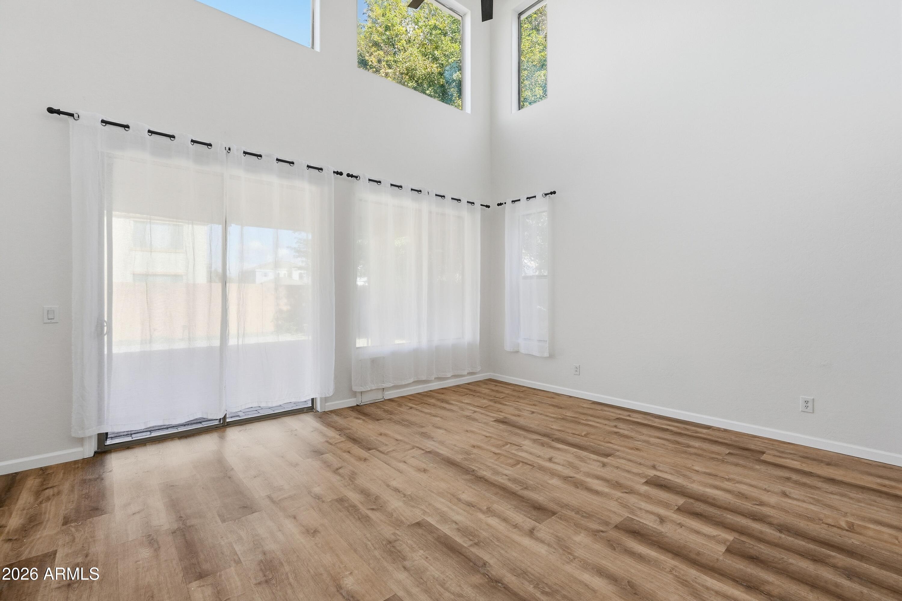 19760 East Mayberry Road Queen Creek, AZ 85142 - Photo 21 of 71 a view of an empty room with a window
