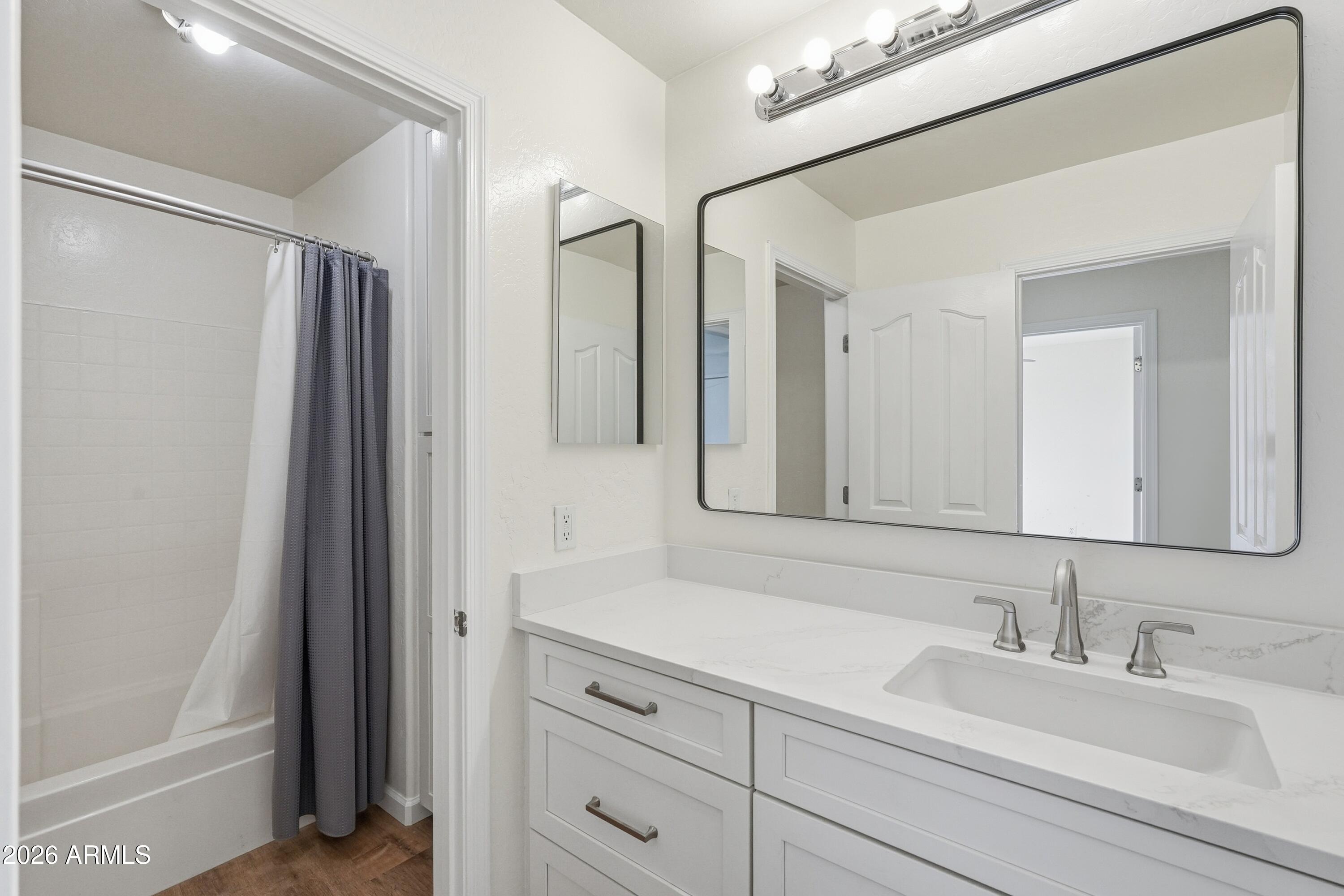 19760 East Mayberry Road Queen Creek, AZ 85142 - Photo 37 of 71 a bathroom with a double vanity sink mirror and