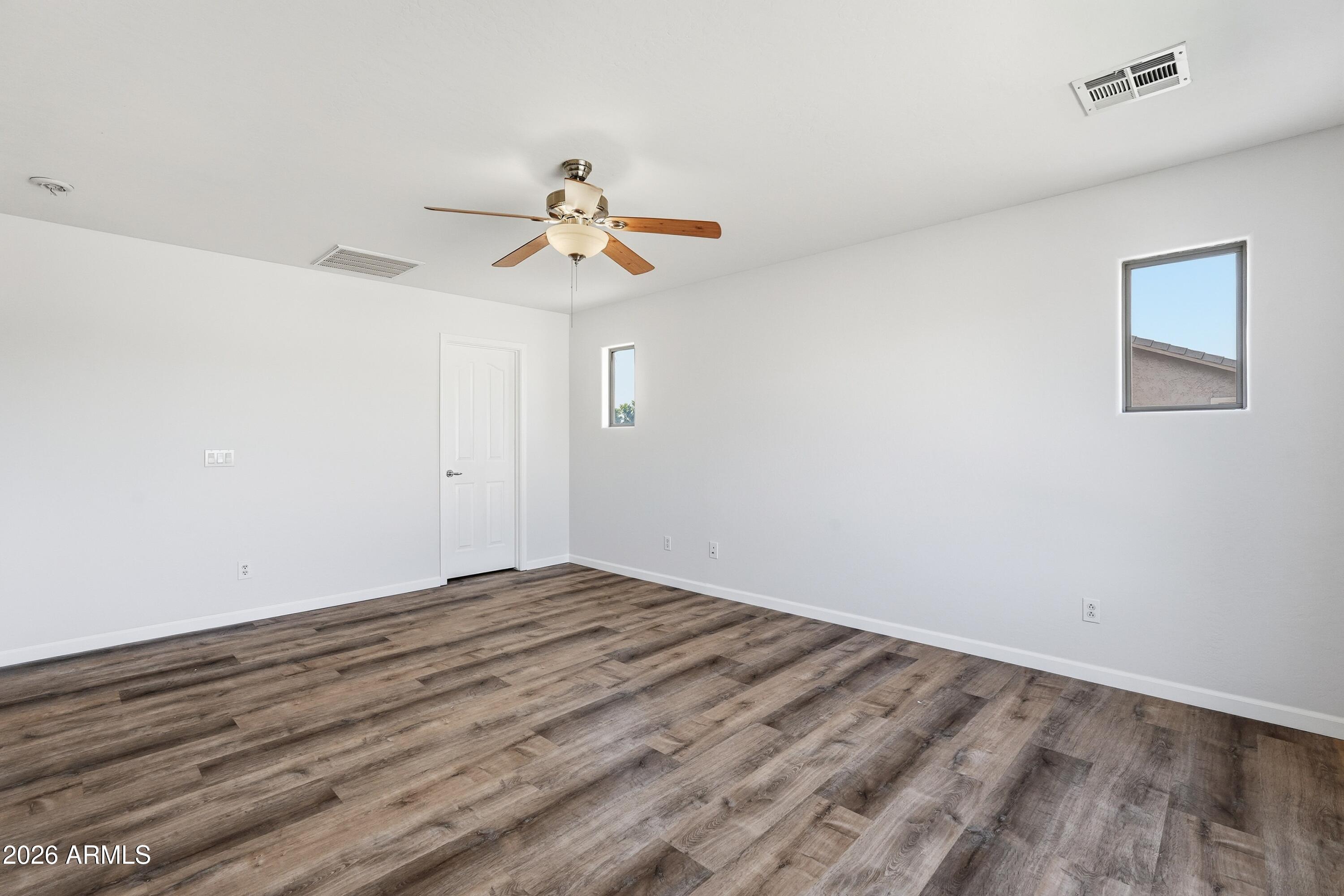19760 East Mayberry Road Queen Creek, AZ 85142 - Photo 47 of 71 a view of room with a ceiling fan