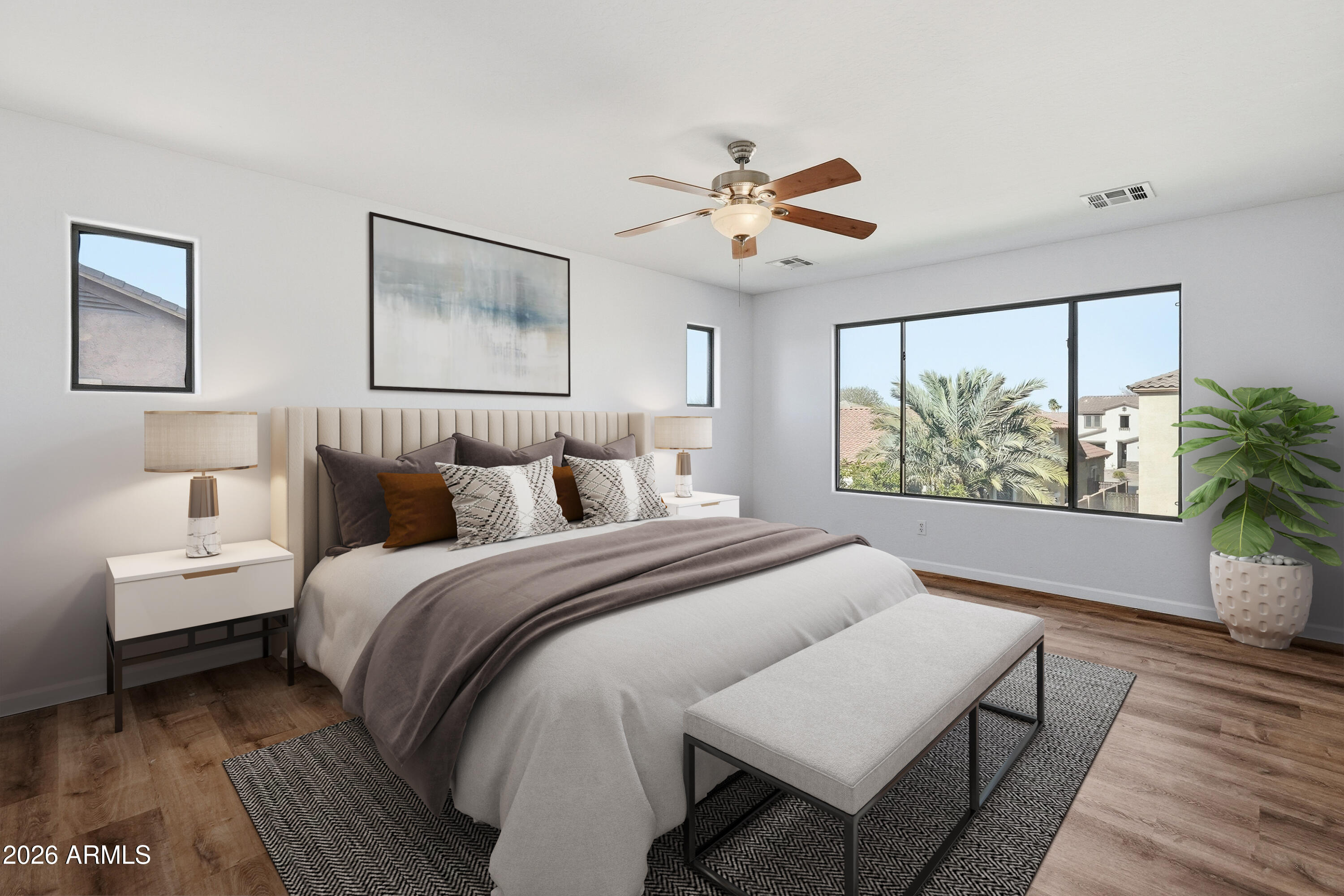 19760 East Mayberry Road Queen Creek, AZ 85142 - Photo 49 of 71 a bedroom with a large bed and a chandelier