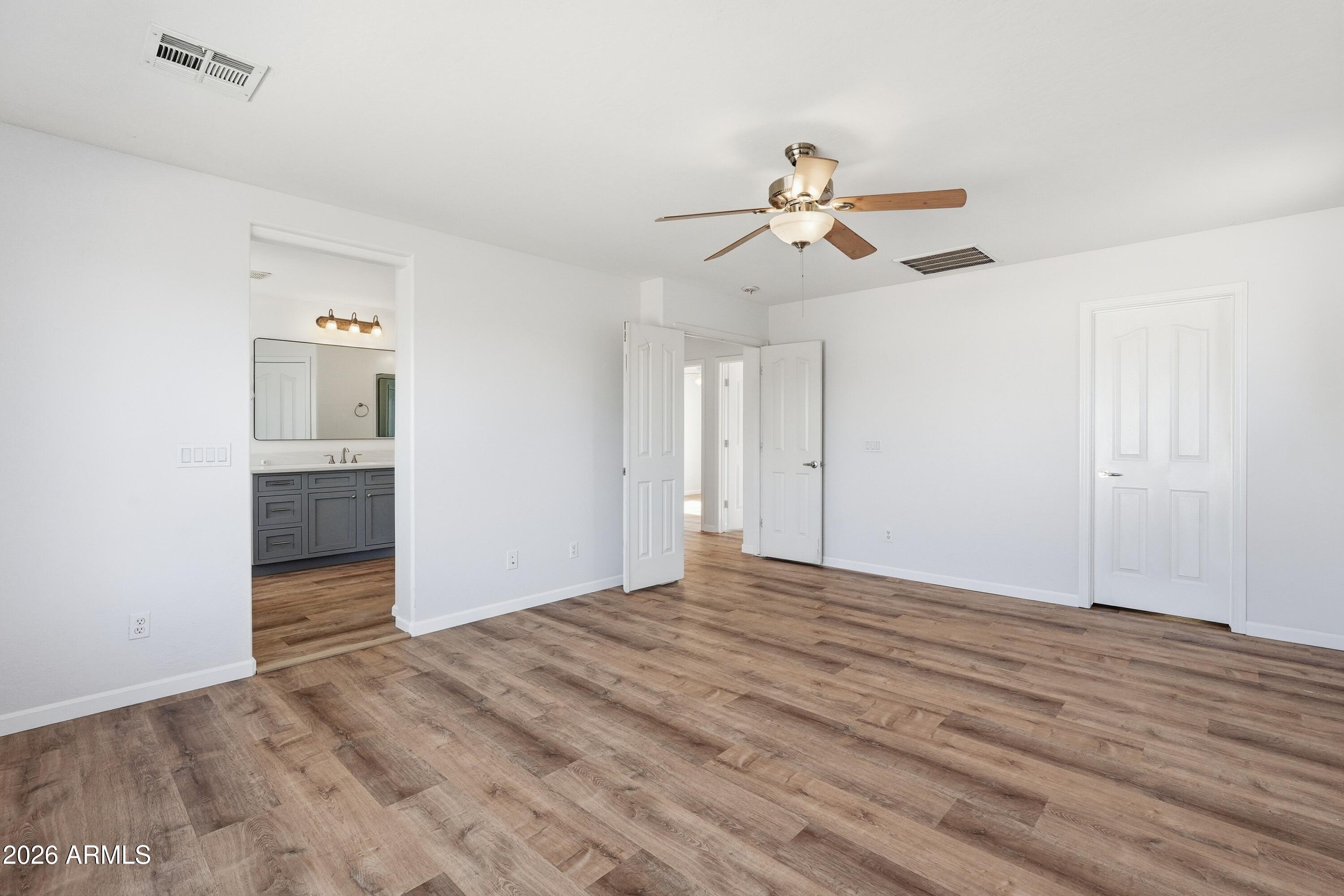 19760 East Mayberry Road Queen Creek, AZ 85142 - Photo 50 of 71 wooden floor in an empty room
