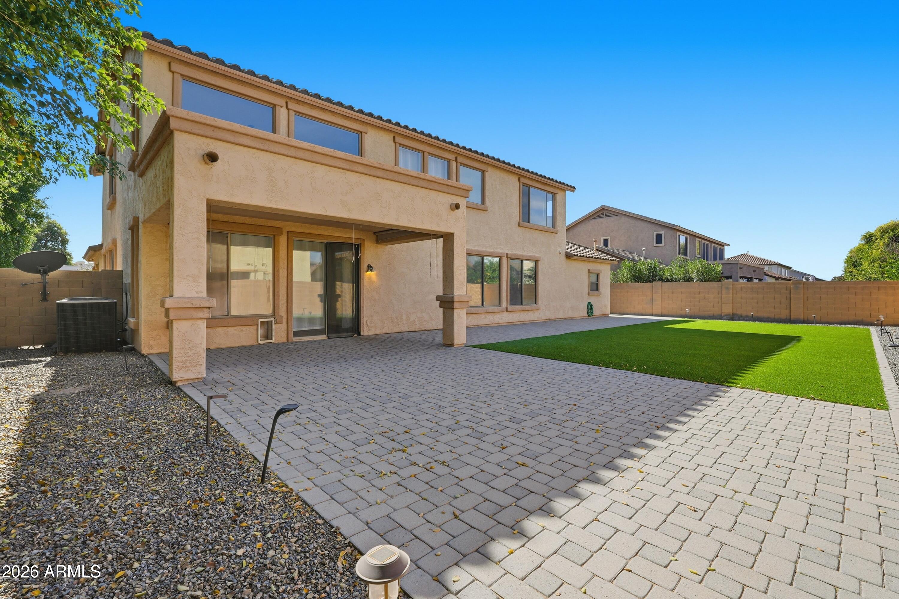 19760 East Mayberry Road Queen Creek, AZ 85142 - Photo 56 of 71 a view of a house with a yard