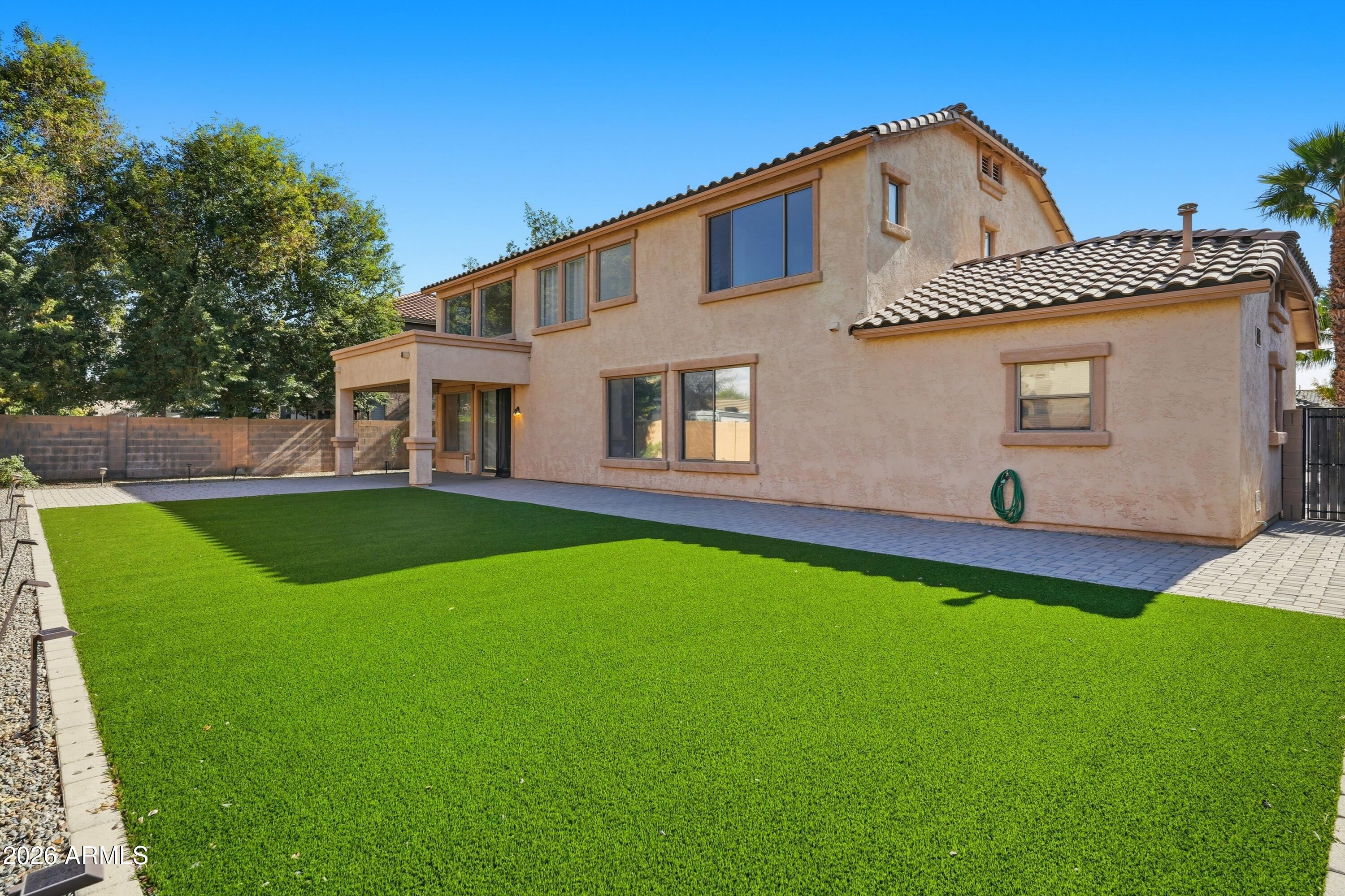 19760 East Mayberry Road Queen Creek, AZ 85142 - Photo 59 of 71 a front view of a house with yard
