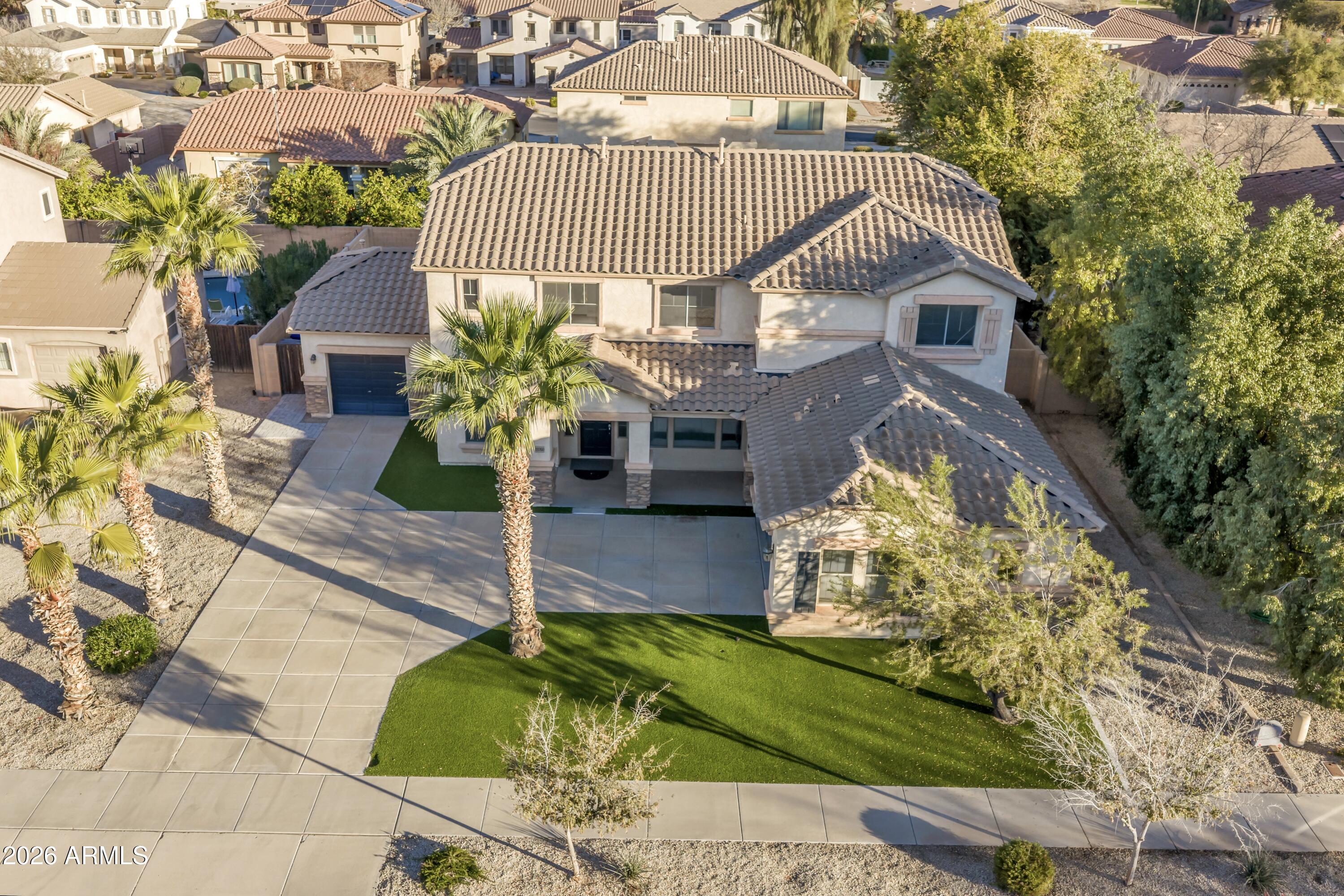 19760 East Mayberry Road Queen Creek, AZ 85142 - Photo 62 of 71 a front view of a house with a yard