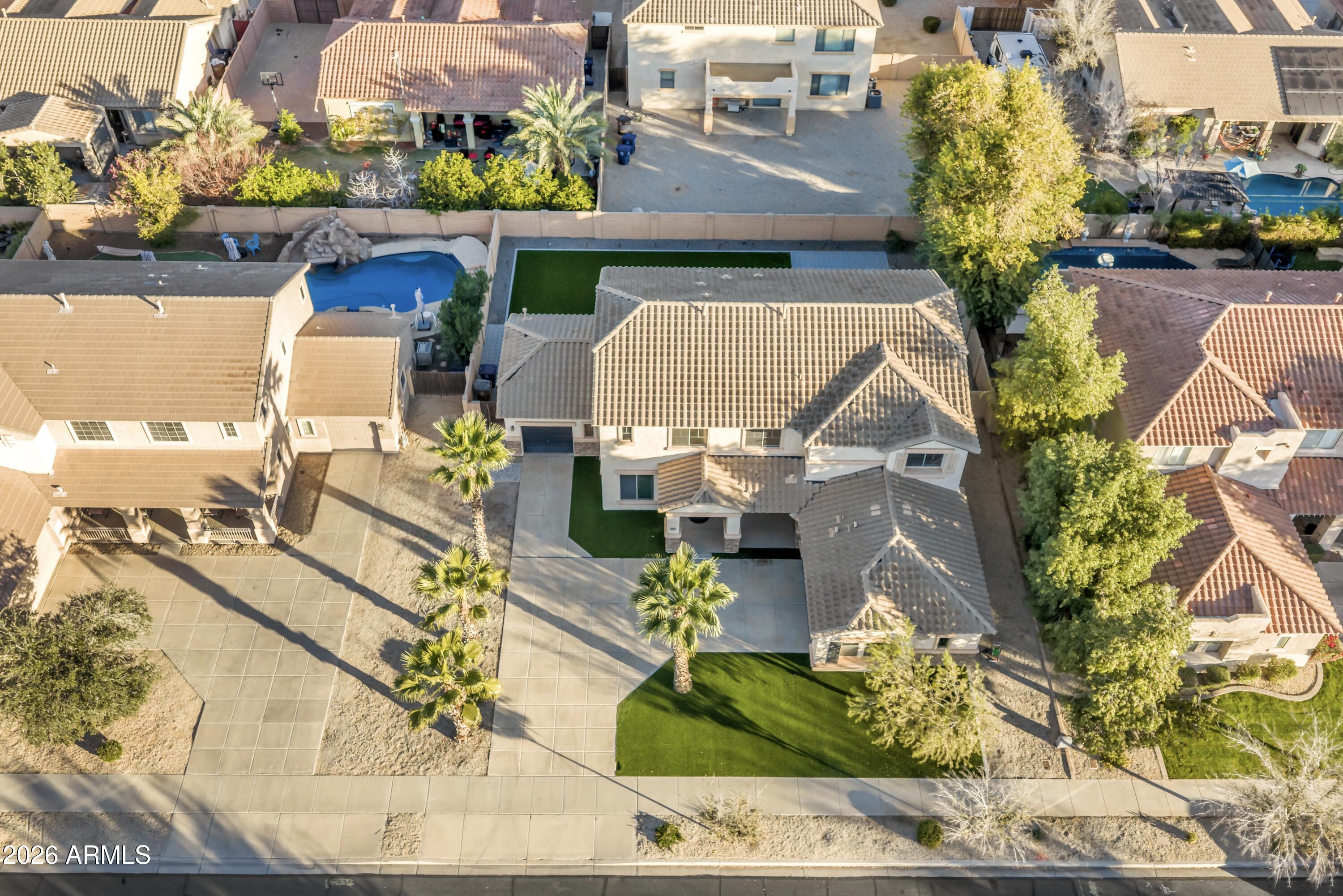 19760 East Mayberry Road Queen Creek, AZ 85142 - Photo 66 of 71 an aerial view of a house with a swimming pool