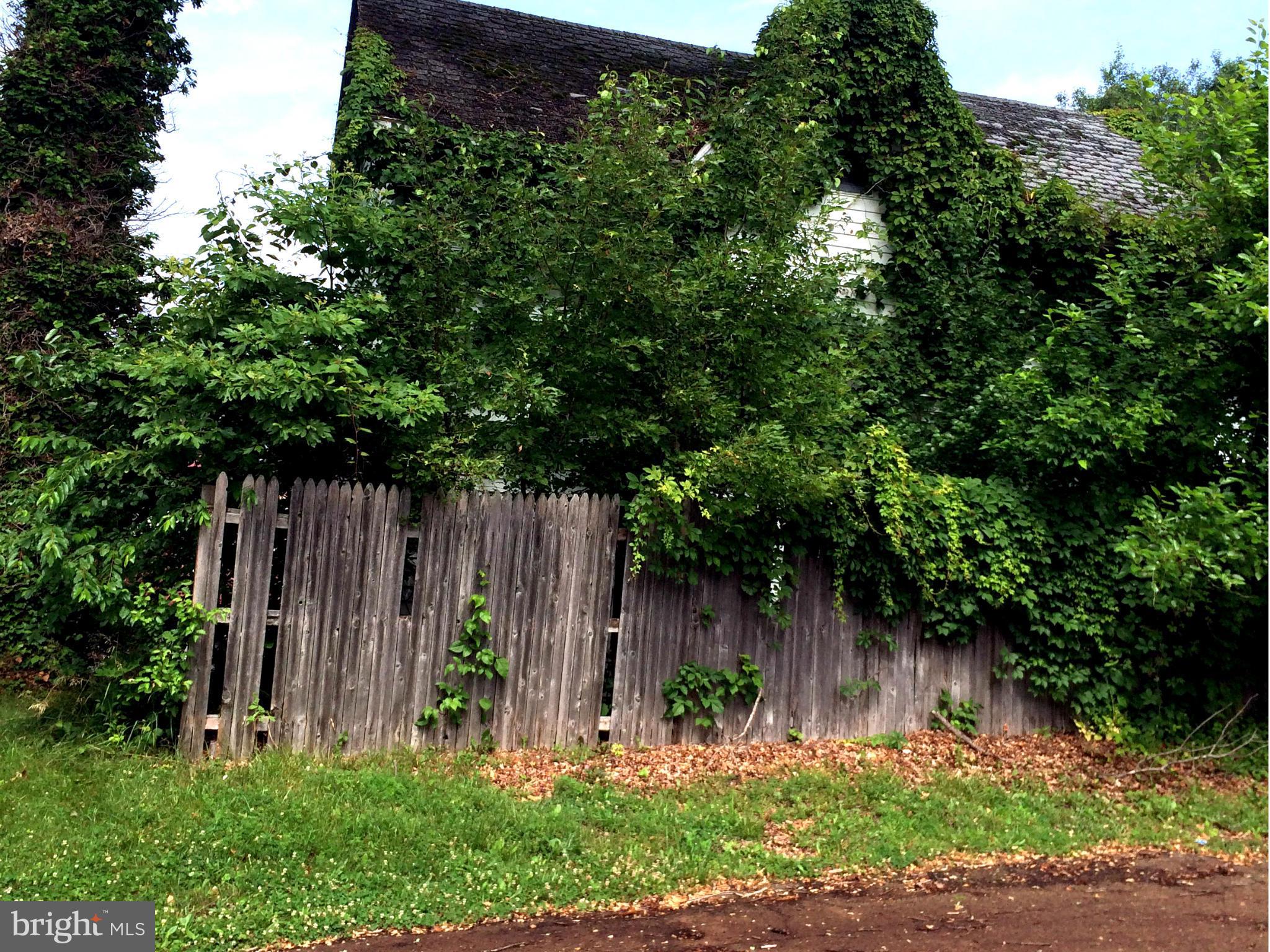 15948 Union Chapel Road Woodbine, MD 21797 - Photo 7 of 19 a wooden fence with trees in the background
