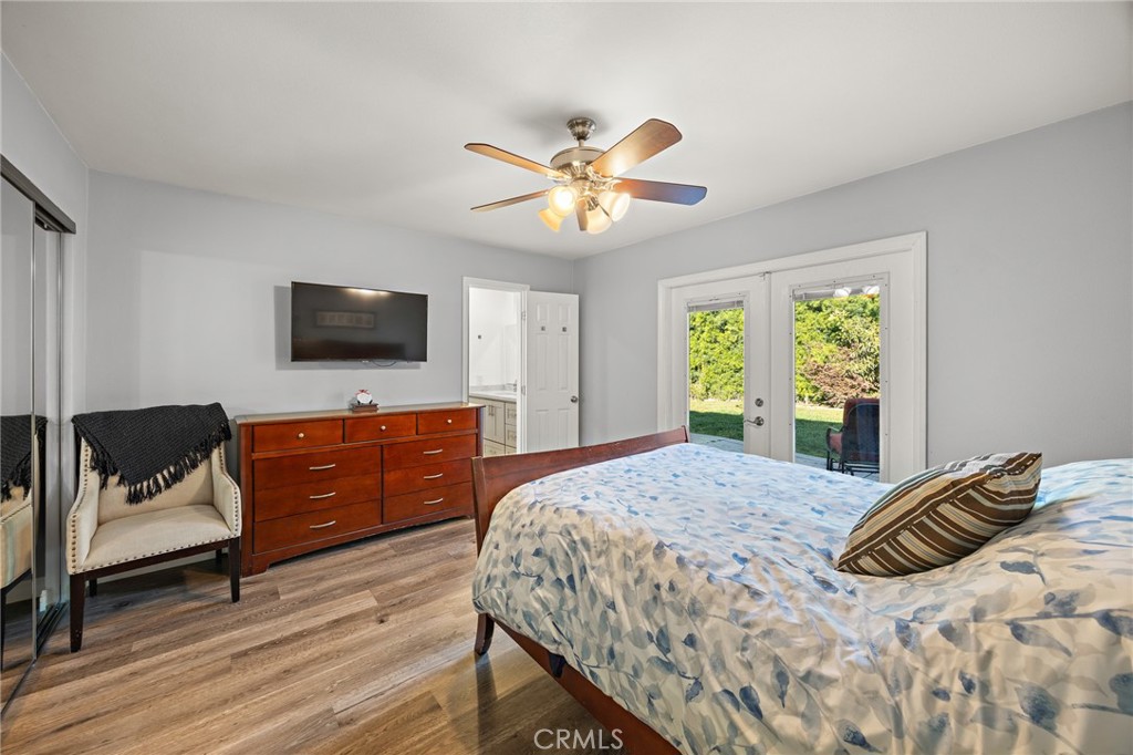 7548 Pepper Street Rancho Cucamonga, CA 91730 - Photo 11 of 24 a bedroom with a bed and a flat screen tv