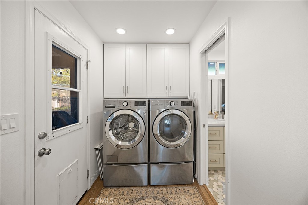 7548 Pepper Street Rancho Cucamonga, CA 91730 - Photo 18 of 24 a view of a storage & utility room with dryer and washer
