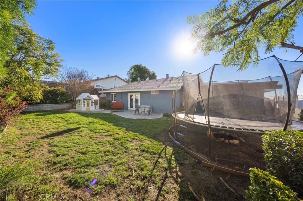 7548 Pepper Street Rancho Cucamonga, CA 91730 - Photo 21 of 24 a front view of a house with garden