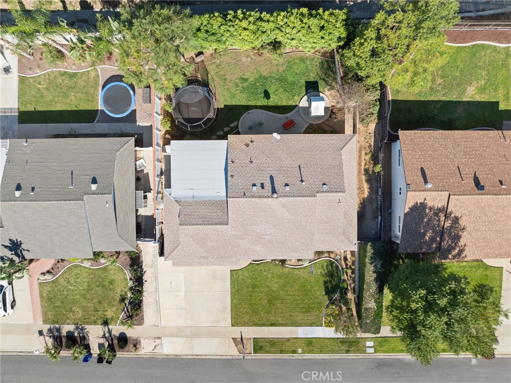 7548 Pepper Street Rancho Cucamonga, CA 91730 - Photo 24 of 24 an aerial view of a house with a yard and a large tree