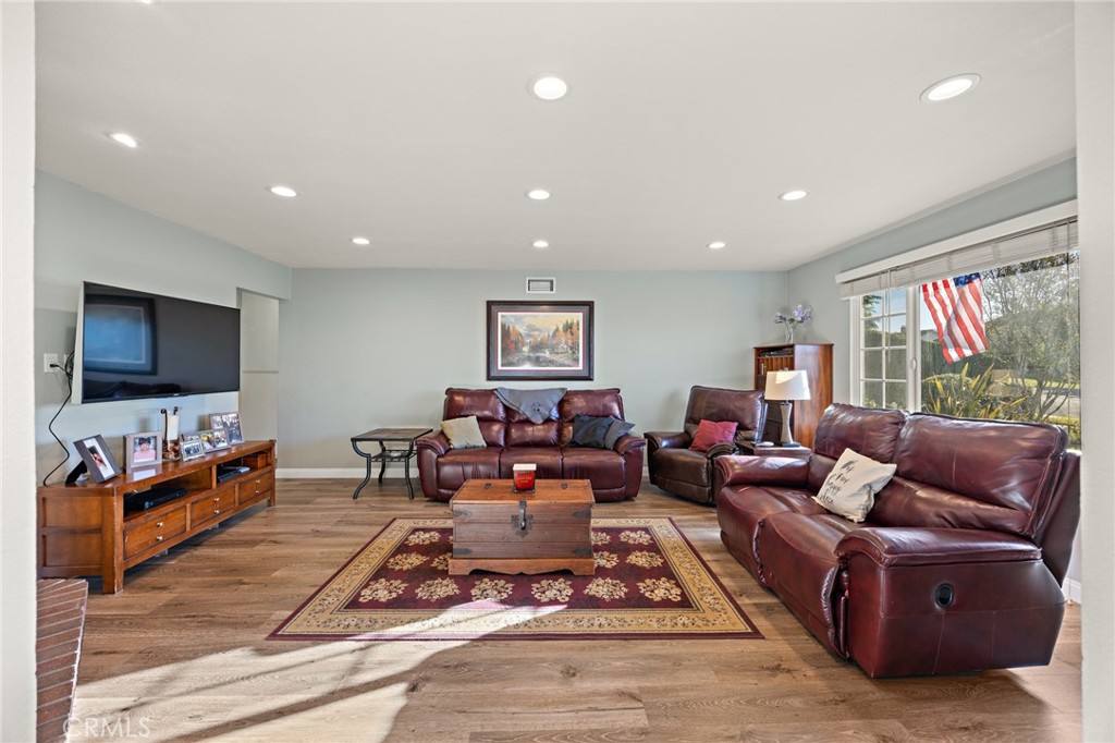7548 Pepper Street Rancho Cucamonga, CA 91730 - Photo 5 of 24 a living room with furniture and a flat screen tv