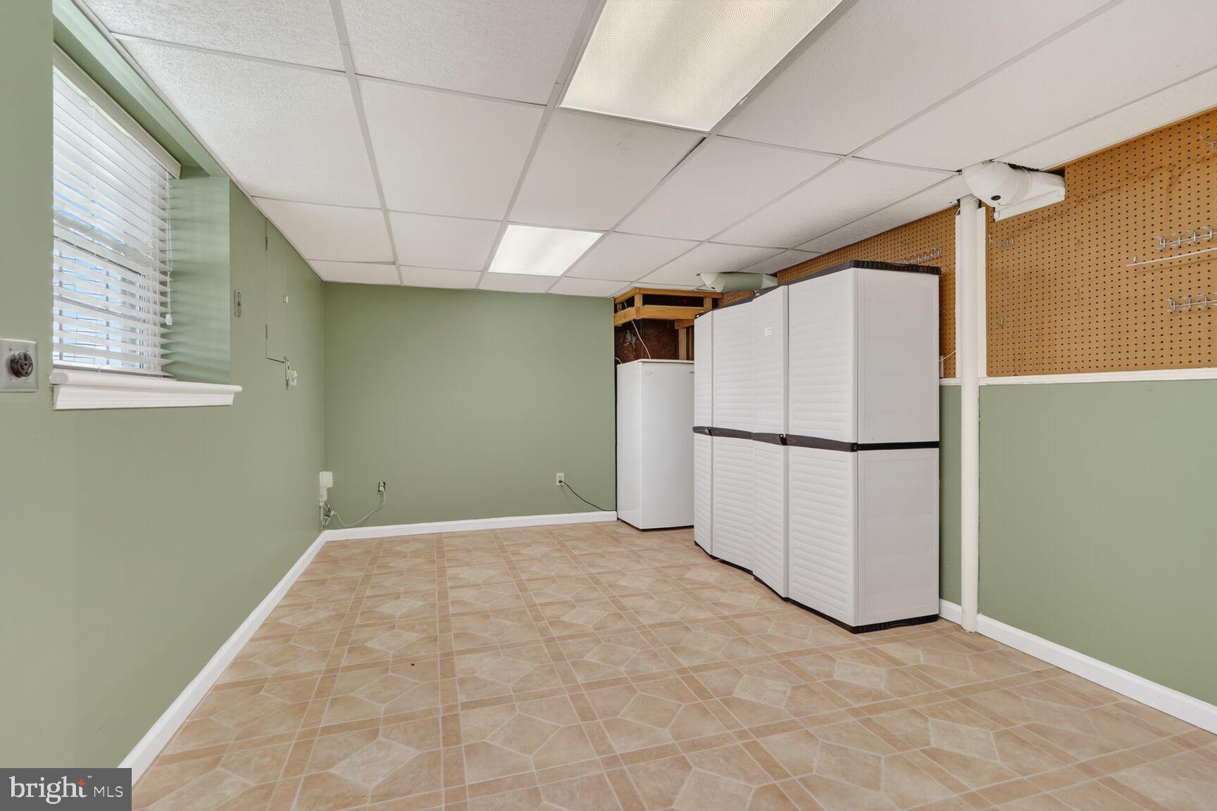 2806 Logway Road Vienna, VA 22181 - Photo 27 of 33 a view of a refrigerator in a kitchen