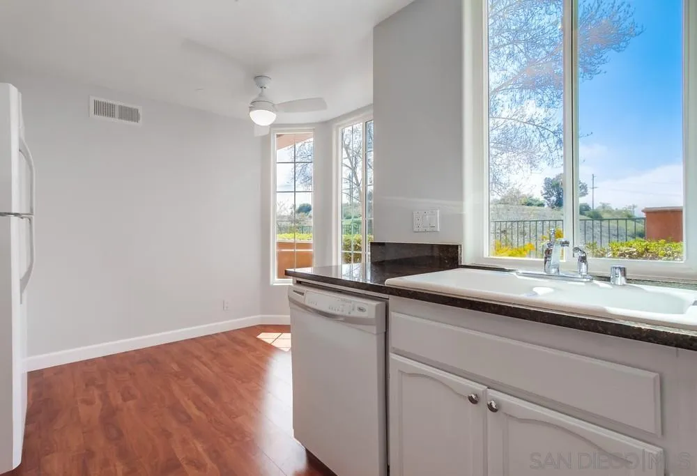 3525 Cameo Drive, Unit 92 Oceanside, CA 92056 - Photo 19 of 43 a kitchen with a sink and a window