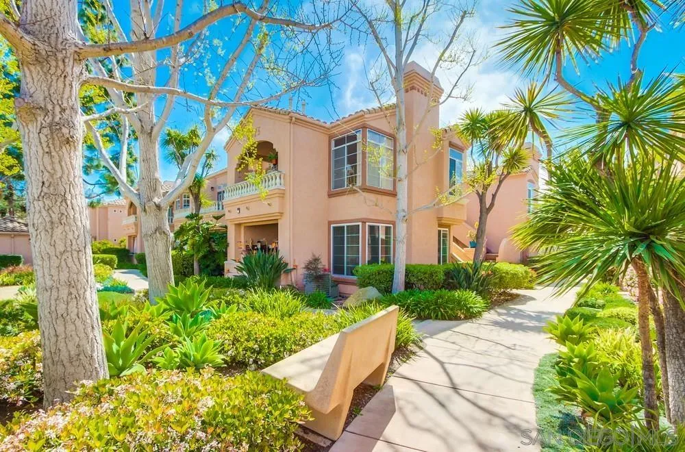 3525 Cameo Drive, Unit 92 Oceanside, CA 92056 - Photo 3 of 43 a view of a multi story residential apartment building and a yard