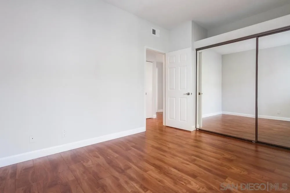 3525 Cameo Drive, Unit 92 Oceanside, CA 92056 - Photo 32 of 43 a view of a livingroom with wooden floor
