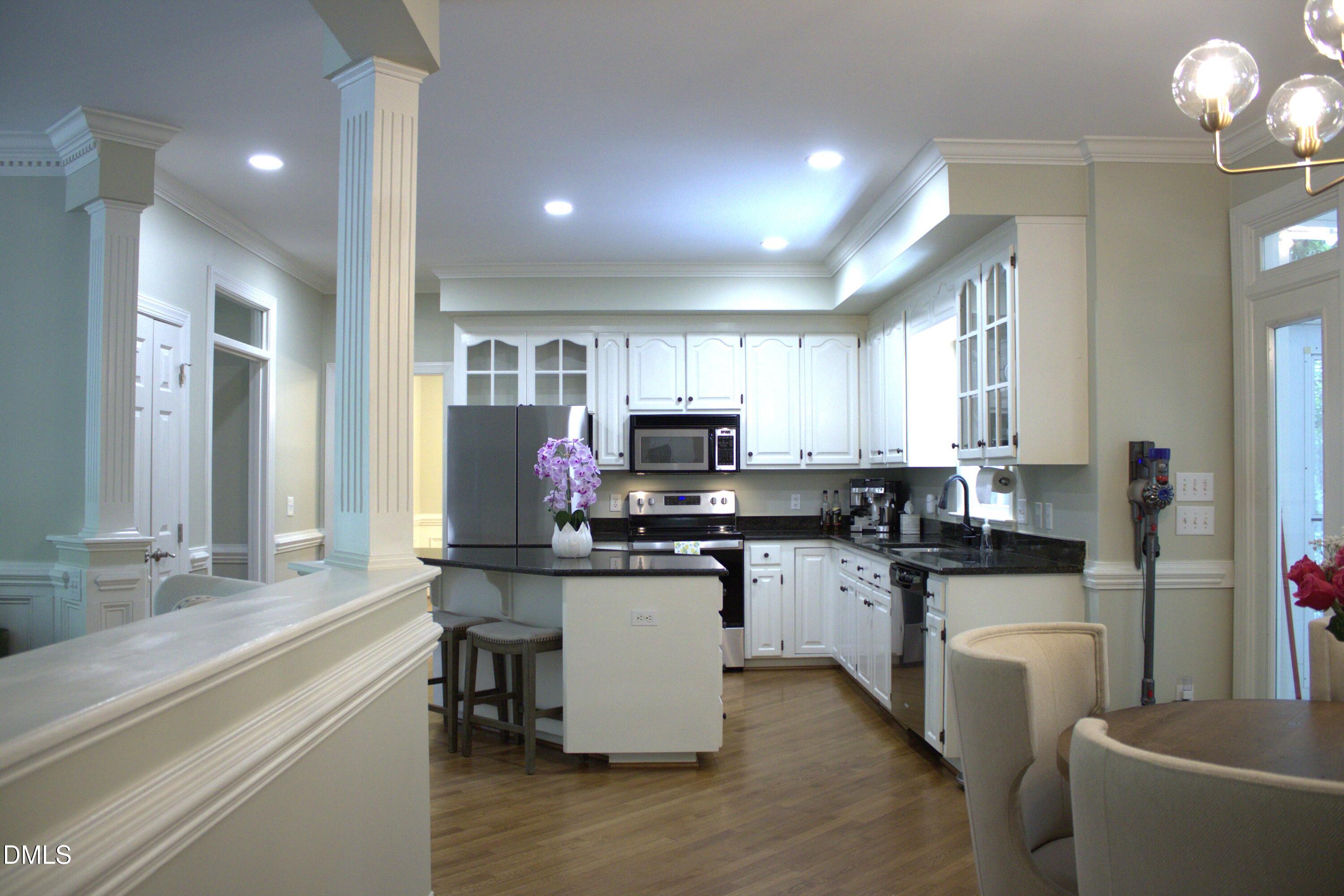 3316 Carrack Court Raleigh, NC 27613 - Photo 11 of 50 A view of the kitchen from the eat in