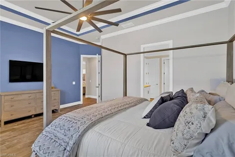 a spacious bathroom with a double vanity sink mirror and shower
