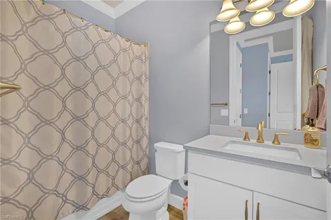 a room with table and fan