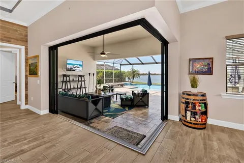 a view of a chairs and table in patio