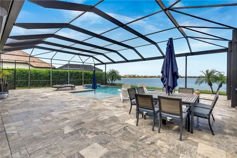 a view of a swimming pool with a porch