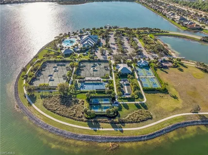 an aerial view of houses with yard