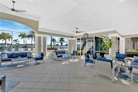 a patio with table and chairs