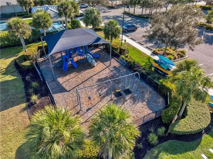 an aerial view of a house with a lake view