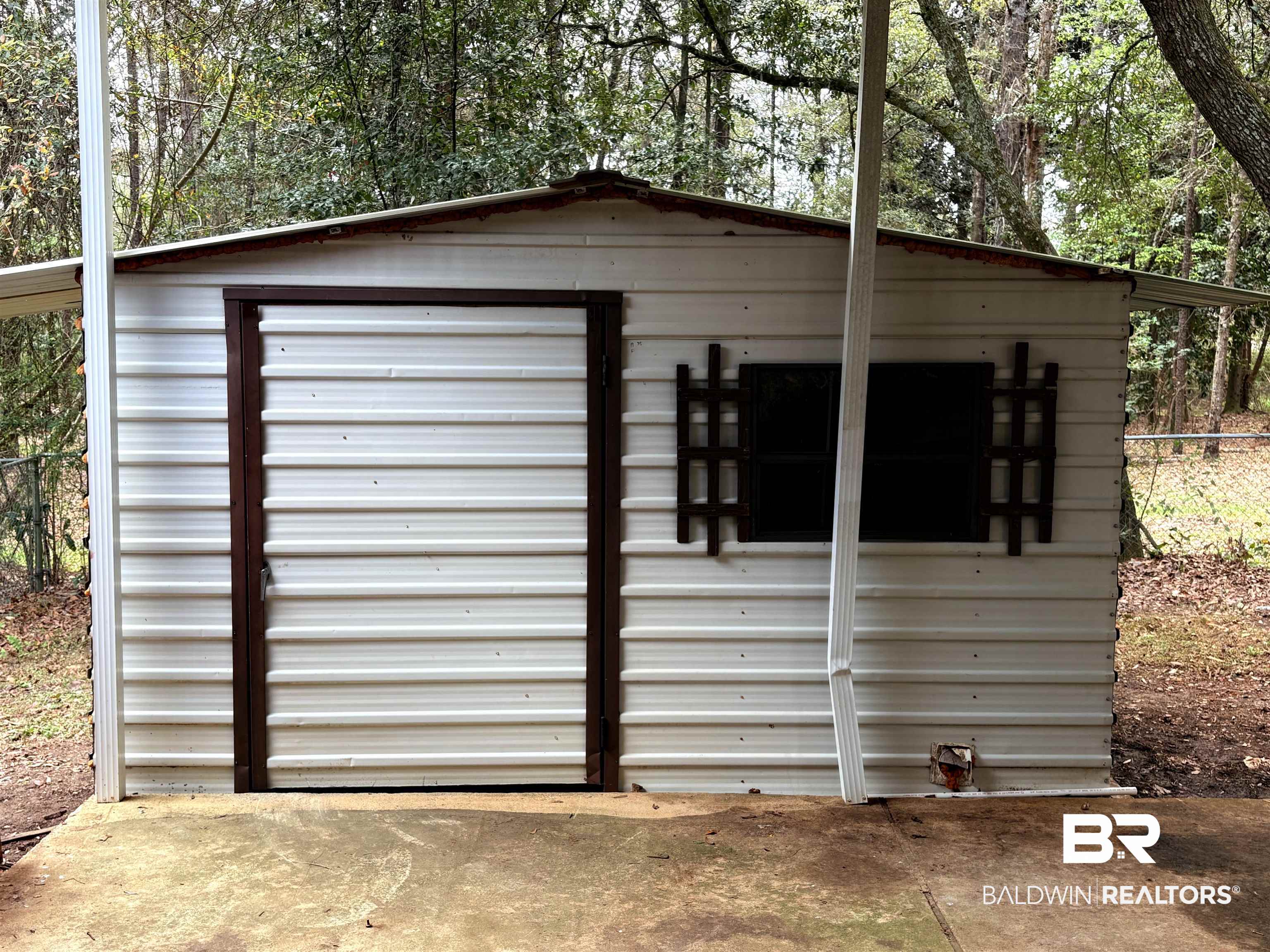 8065 Middle Ring Road Mobile, AL 36619 - Photo 14 of 21 View of shed featuring fence