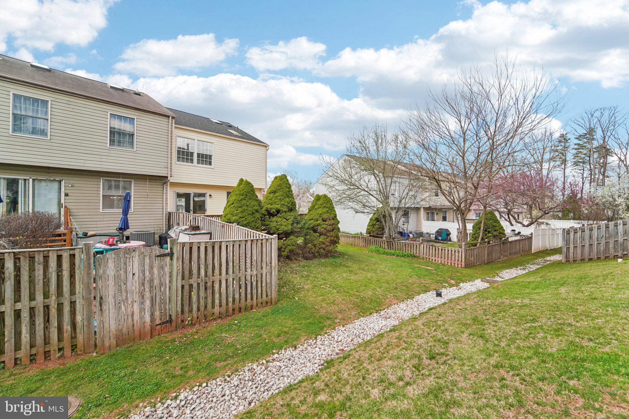 8727 Silver Hall Road Perry Hall, MD 21128 - Photo 26 of 35 a view of a house with a yard and pathway