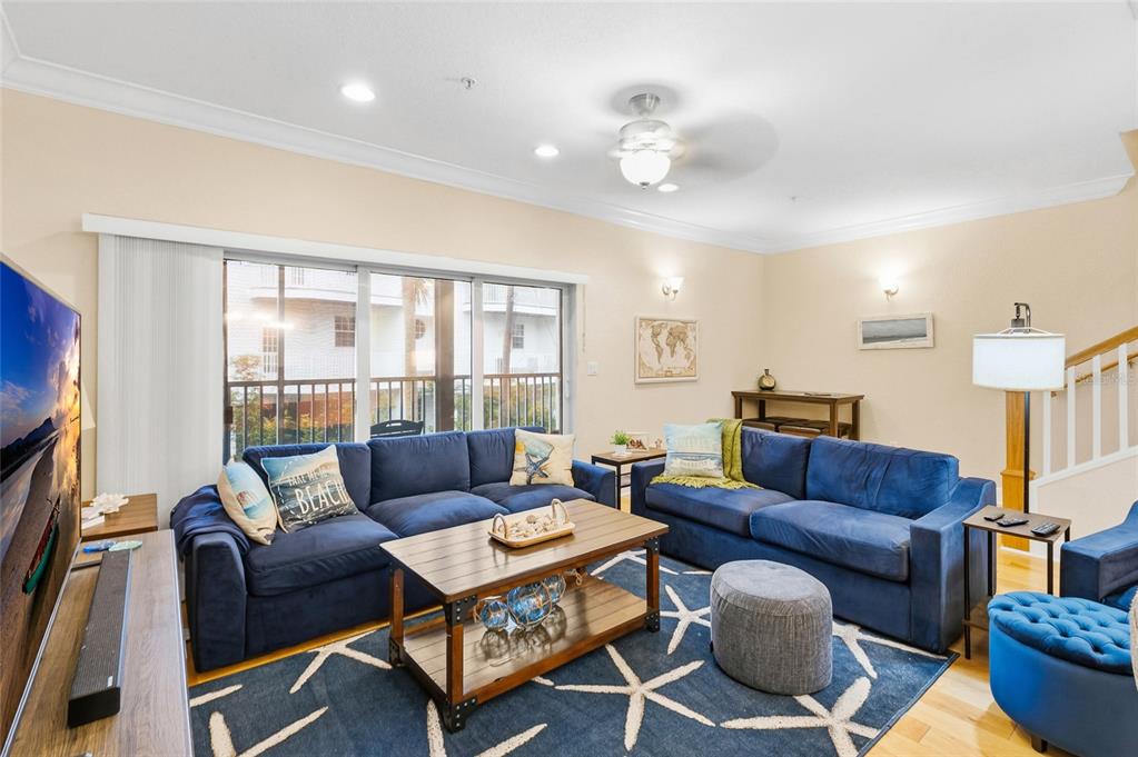 150 164th Avenue Redington Beach, FL 33708 - Photo 13 of 64 a living room with furniture ceiling fan and a rug