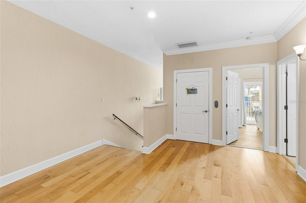 150 164th Avenue Redington Beach, FL 33708 - Photo 17 of 64 wooden floor in an empty room