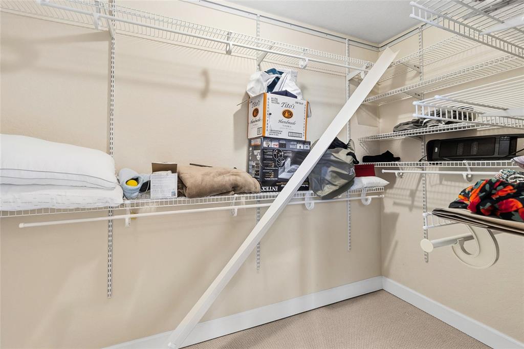 150 164th Avenue Redington Beach, FL 33708 - Photo 21 of 64 a view of storage and utility room with stairs