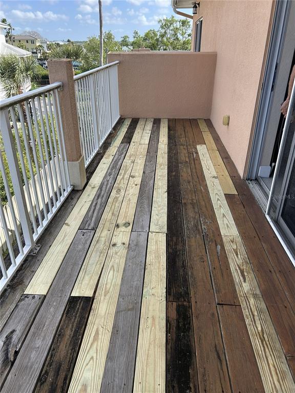 150 164th Avenue Redington Beach, FL 33708 - Photo 26 of 64 a view of balcony with wooden floor