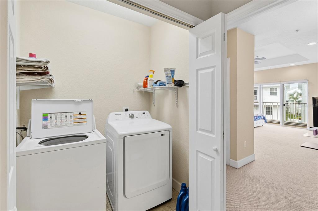 150 164th Avenue Redington Beach, FL 33708 - Photo 43 of 64 a utility room with dryer and washer