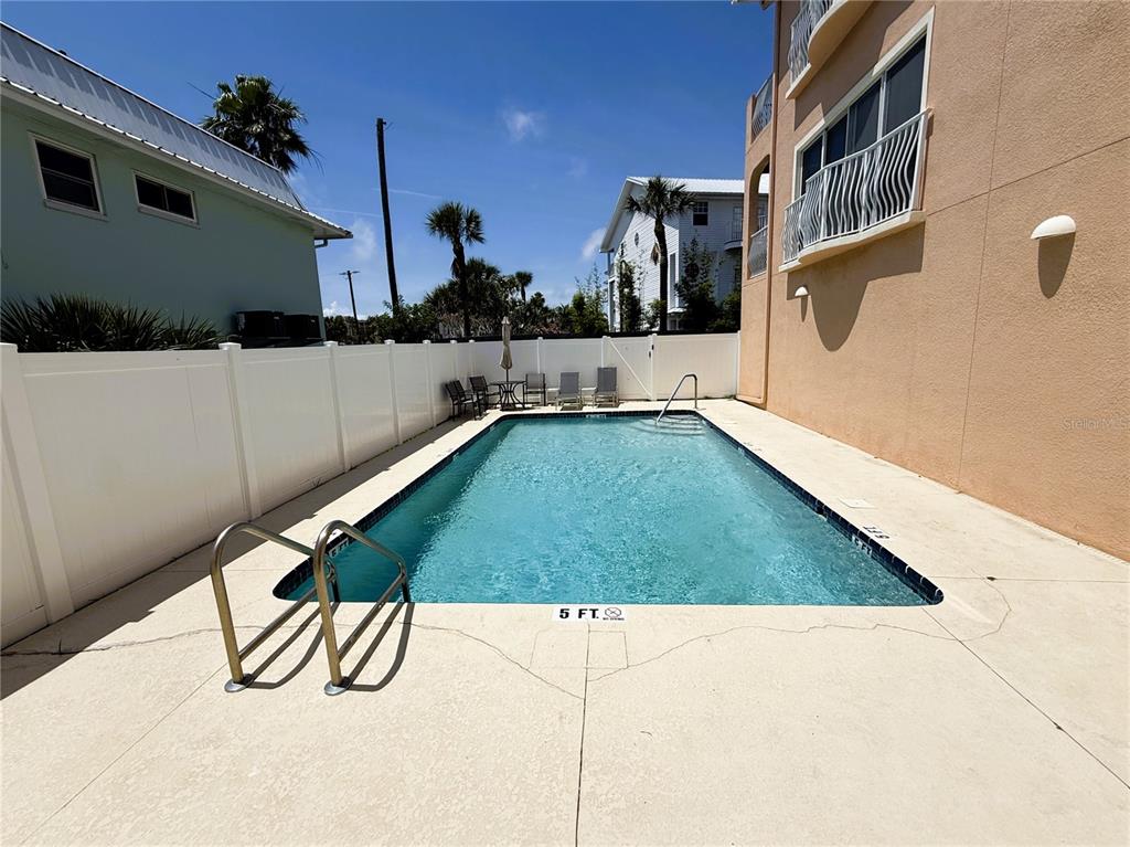 150 164th Avenue Redington Beach, FL 33708 - Photo 46 of 64 a view of a backyard with sitting area