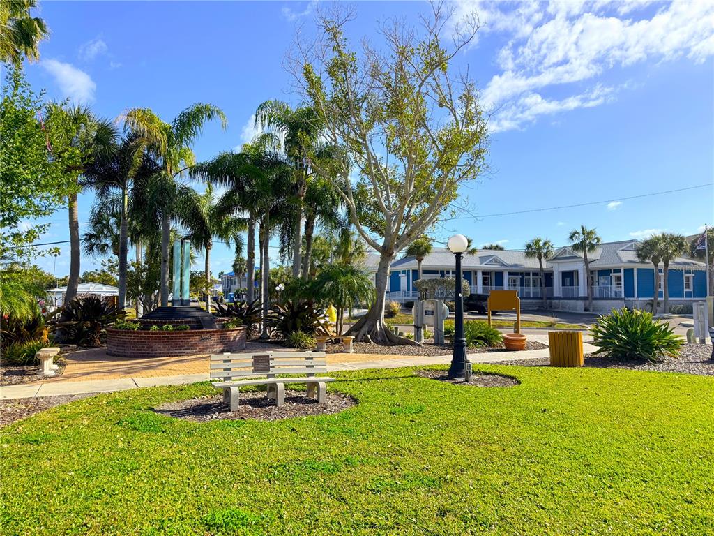 150 164th Avenue Redington Beach, FL 33708 - Photo 57 of 64 a view of a park with swings and slides